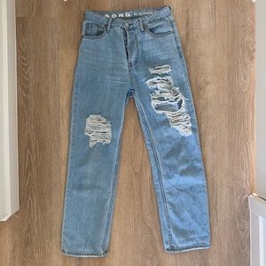 Distressed 90’s Boyfriend Jeans. High waisted & button fly. Straight/wide leg.